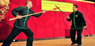 Samuel Mendonca and Fabricio Pirez Performing Double Saber Vs. Spear